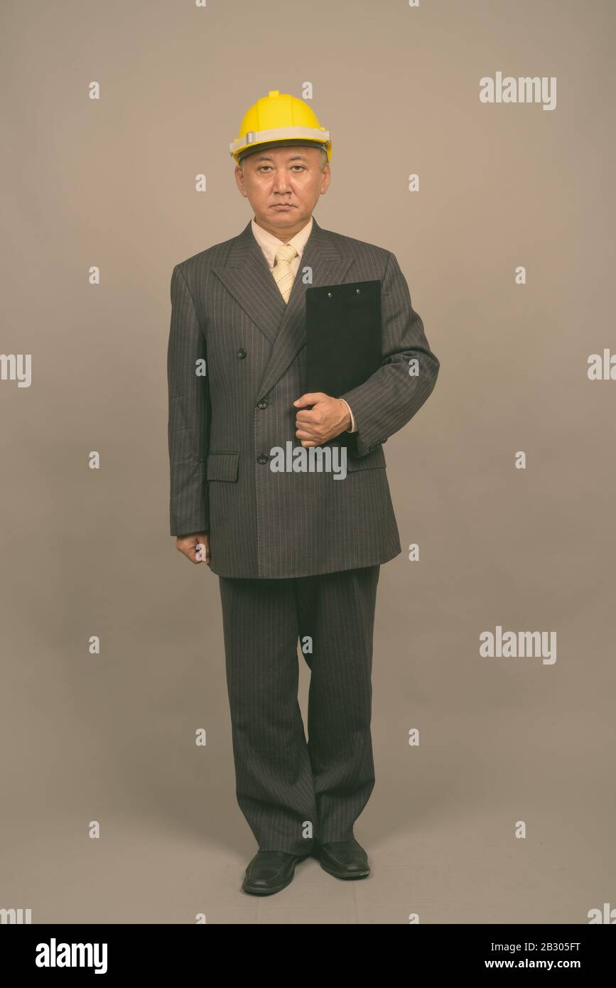 Full body asian male engineer hi-res stock photography and images - Alamy