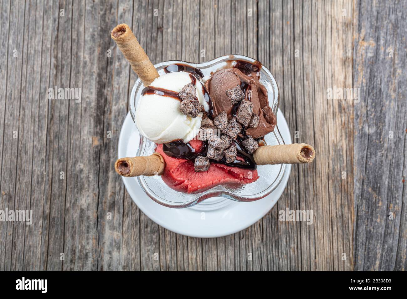 Sundae Stick Vanilla, strawberry and chocolate sundae dish ice cream with wafer ...