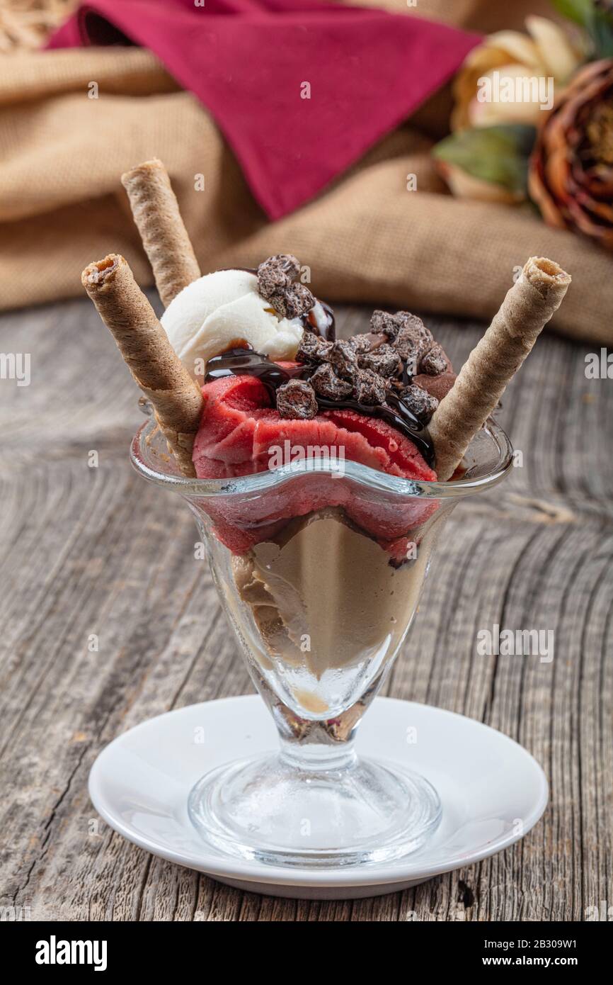 Sundae Stick Vanilla, strawberry and chocolate sundae dish ice cream with wafer ...