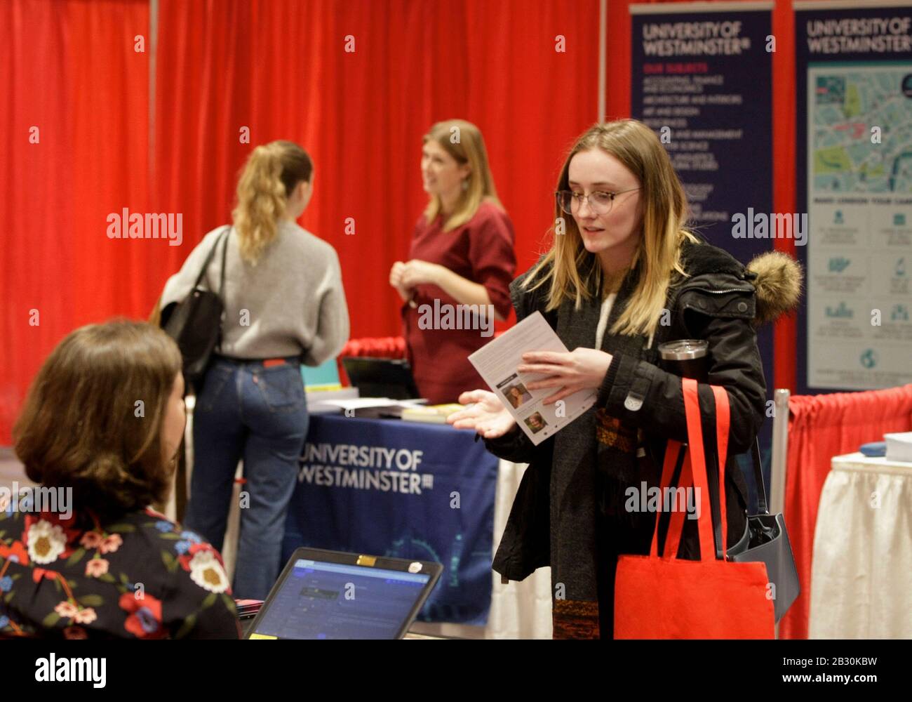 Vancouver, Canada. 3rd Mar, 2020. A student asks information at a 