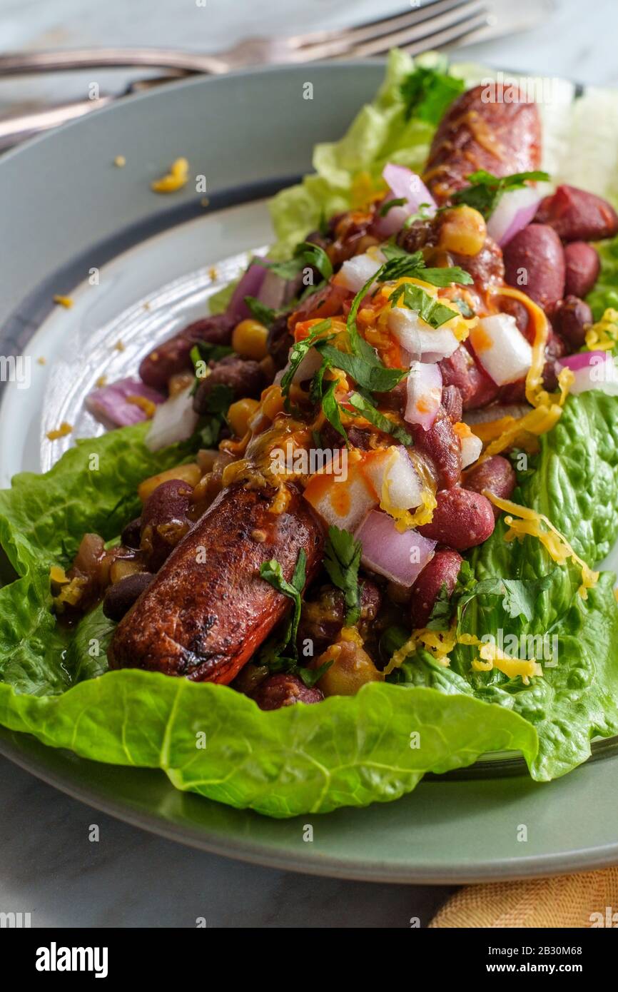 Fancy glutenfree diet nobun chili hot dog lettuce wraps Stock Photo