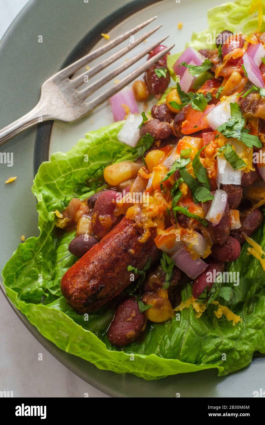 Fancy glutenfree diet nobun chili hot dog lettuce wraps Stock Photo