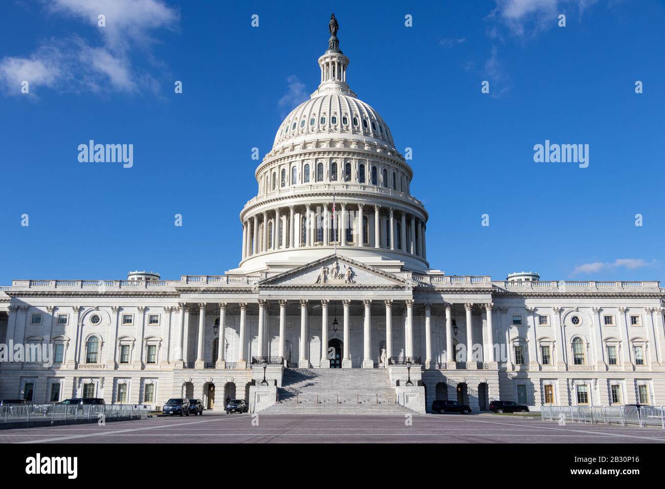 US Capital Building from the east plaza of the US Capital Grounds on a clear day in the United States capital city. Stock Photo