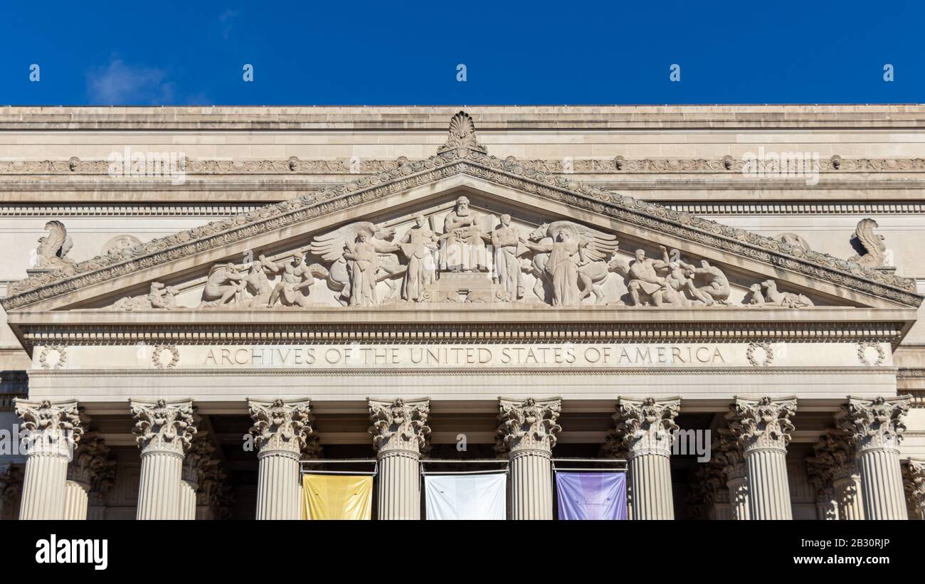 Top of the National Archives building with the engraved text 'Archives of The United States of America'. Stock Photo