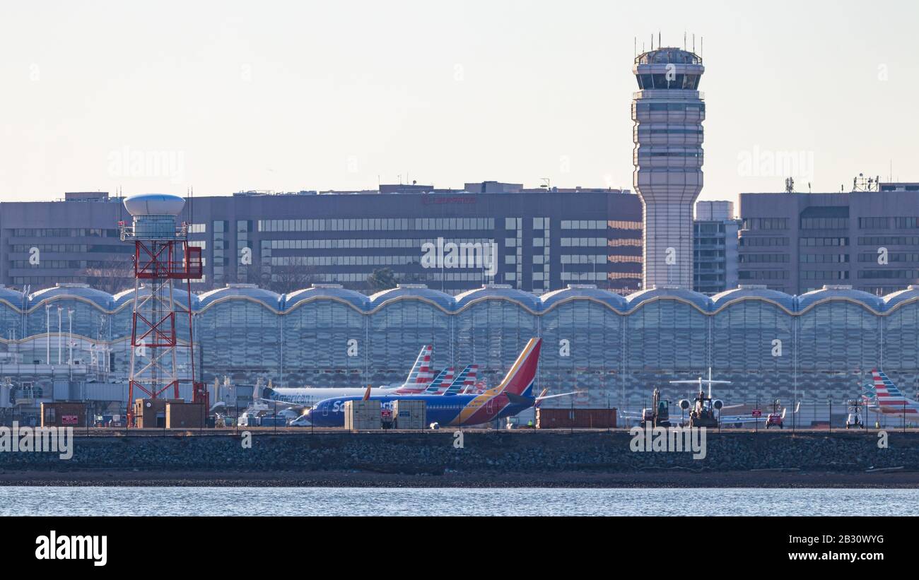 View from across the Potomac River in Washington, D.C. looking at Reagan Washington National Airport on a sunny day. Stock Photo