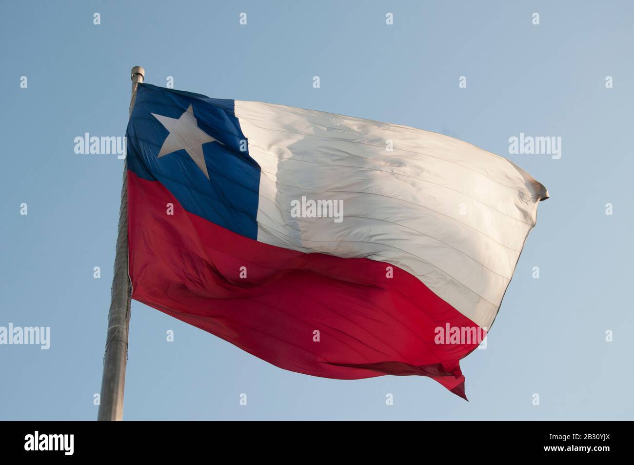 Chilean flag flying at the Palacio de La Moneda, Santiago Stock Photo