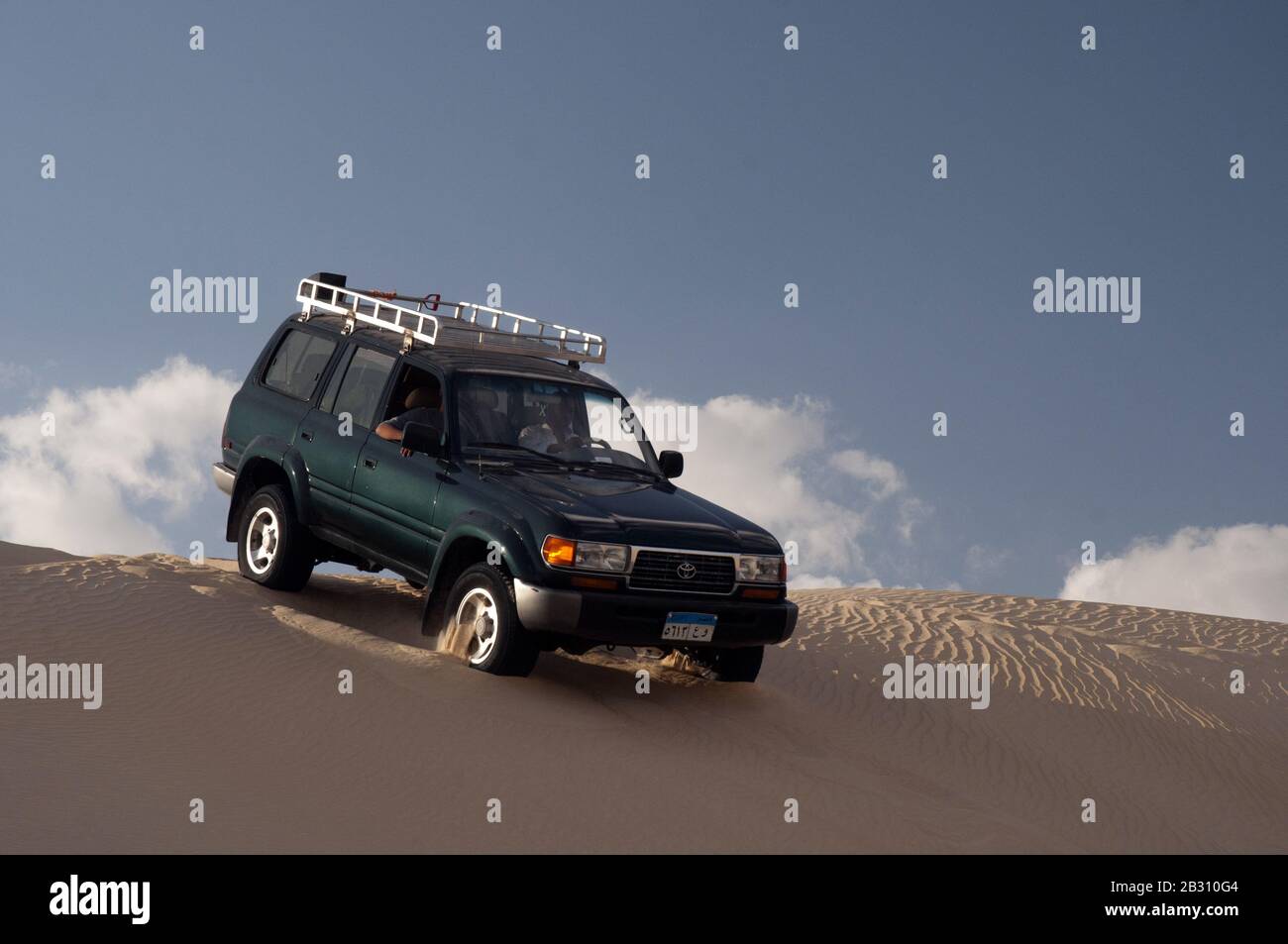 Offroading in the sand dunes of the Great Sand Sea, Siwa, Egypt Stock Photo