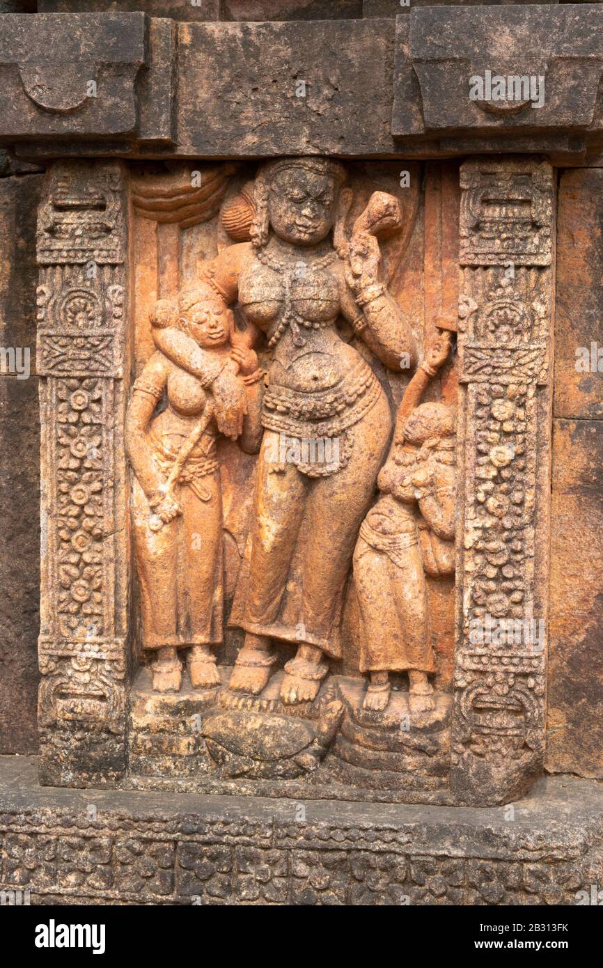 Female Goddess with attendants, Monastery No 1, Buddhist site, 9th century AD, Ratnagiri, Orissa, India Stock Photo