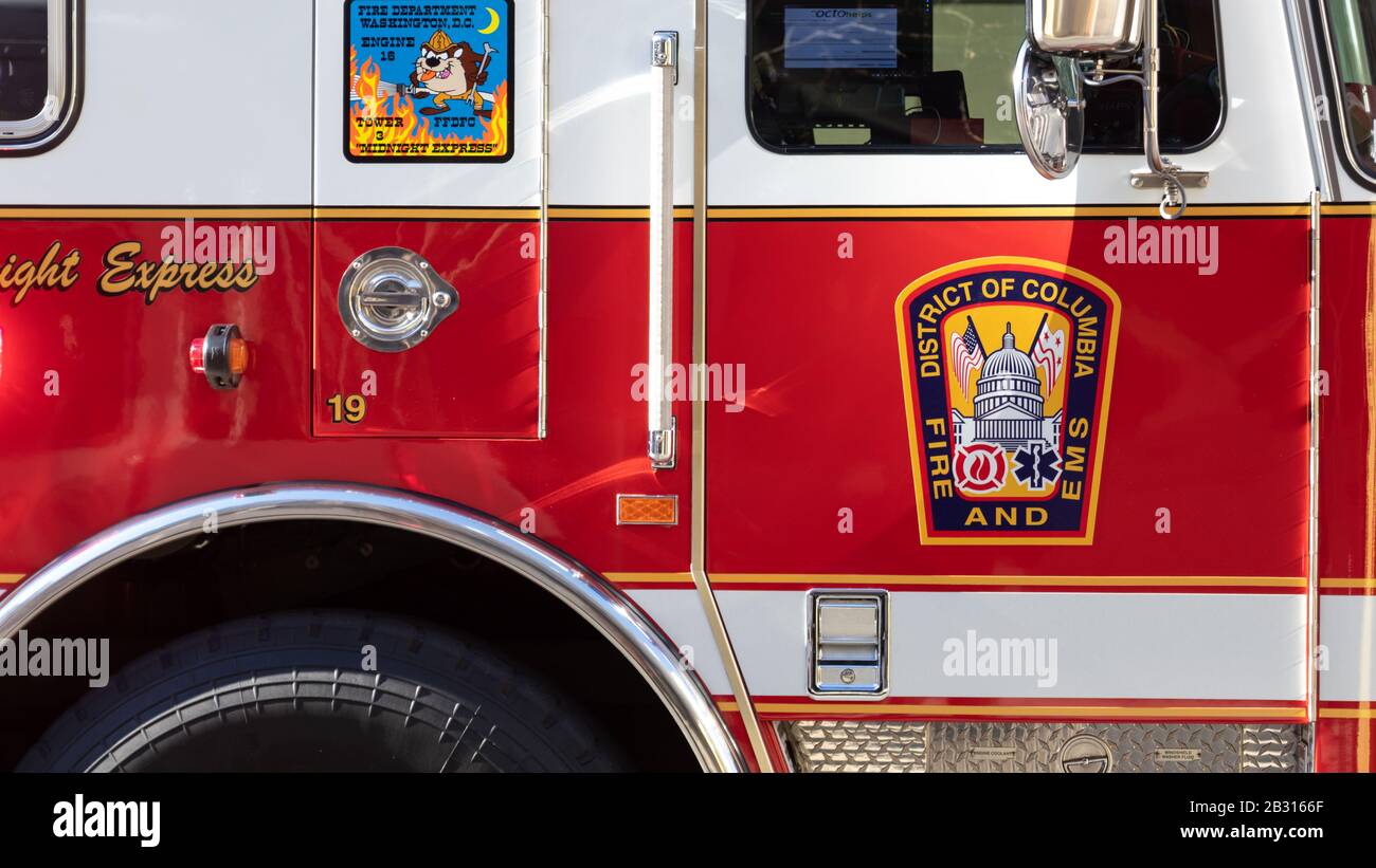 District of Columbia Fire and EMS badge on the side of the 'Midnight Express' fire truck on-scene in Washington. Stock Photo