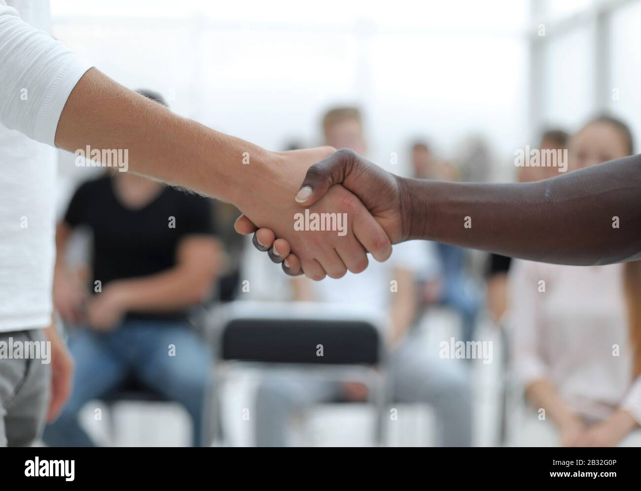close up. diverse young participants of the workshop, applauded in ...