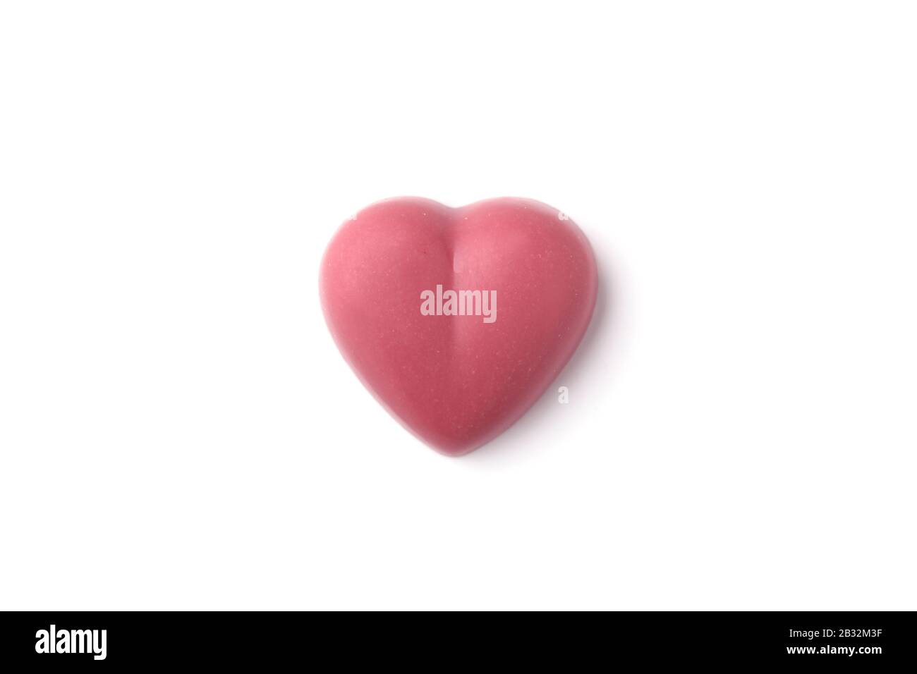 heart shaped pink ruby chocolate closeup isolated on white background Stock Photo