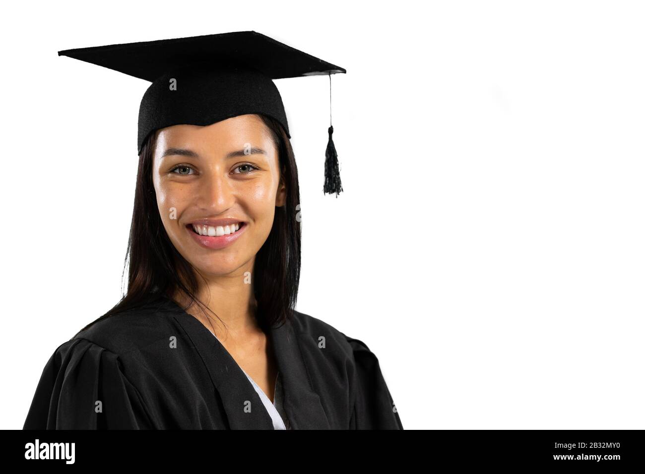 Mixed race female student on white background Stock Photo
