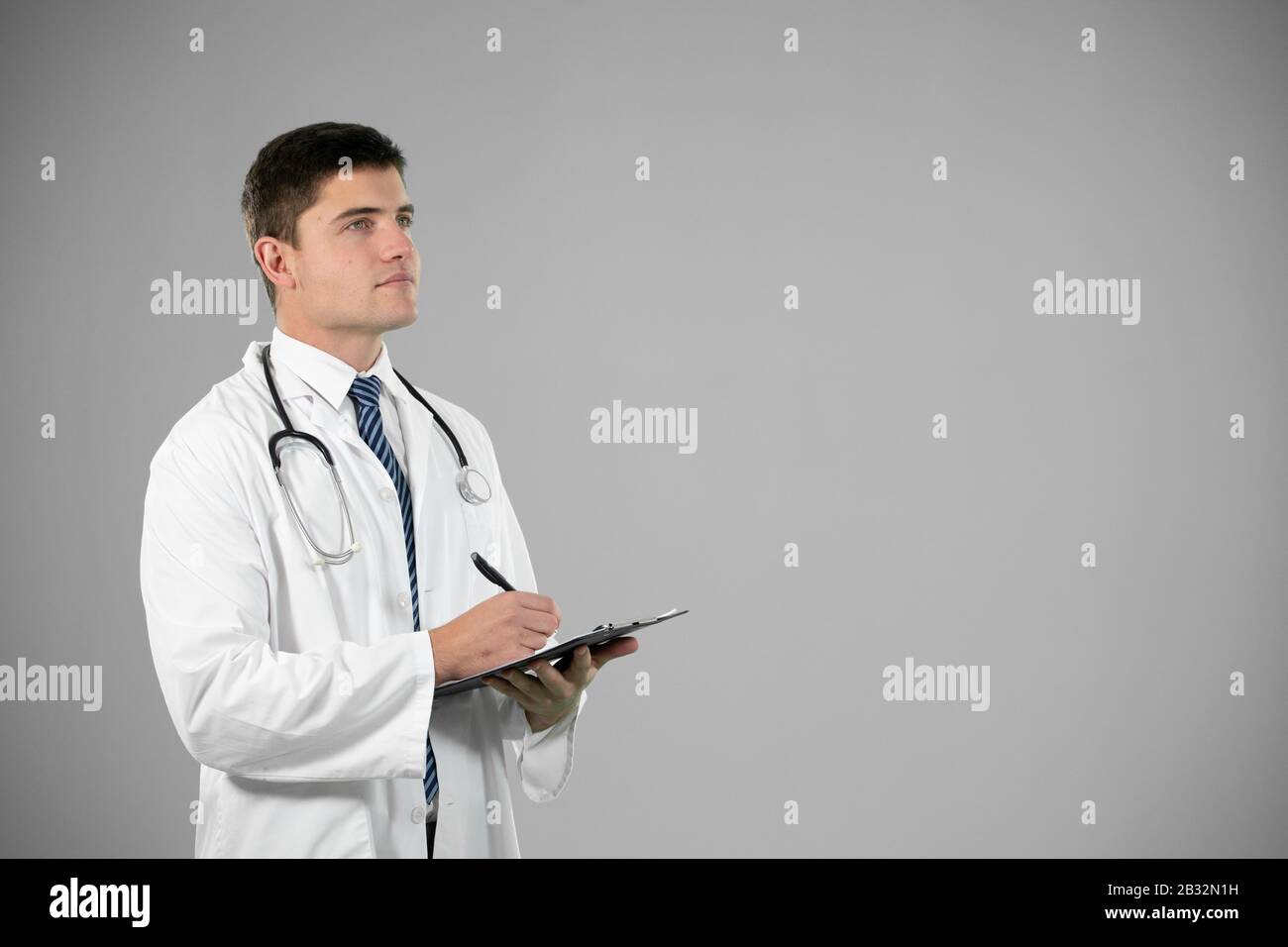 Young male doctor making hi-res stock photography and images - Alamy