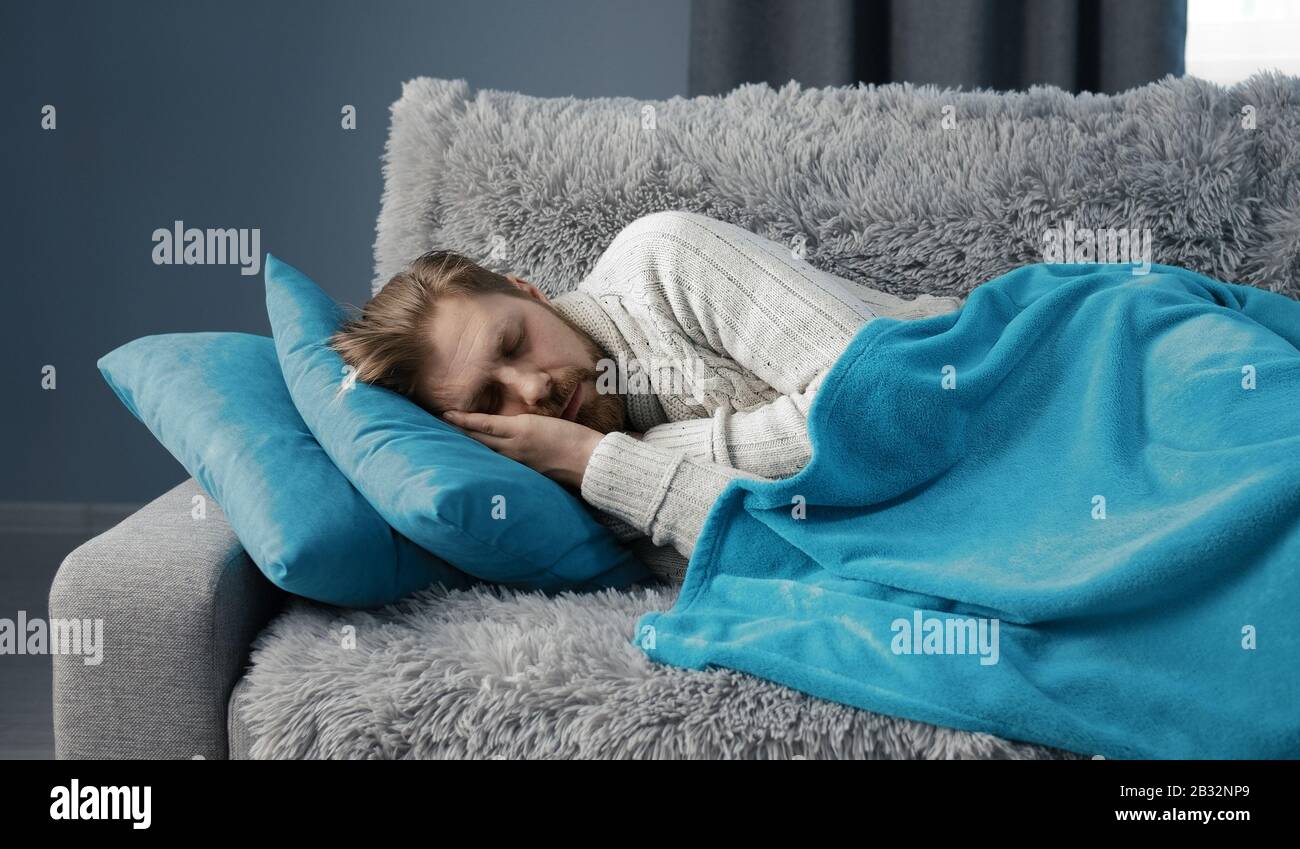 Diseased man sleeping on sofa Stock Photo Alamy