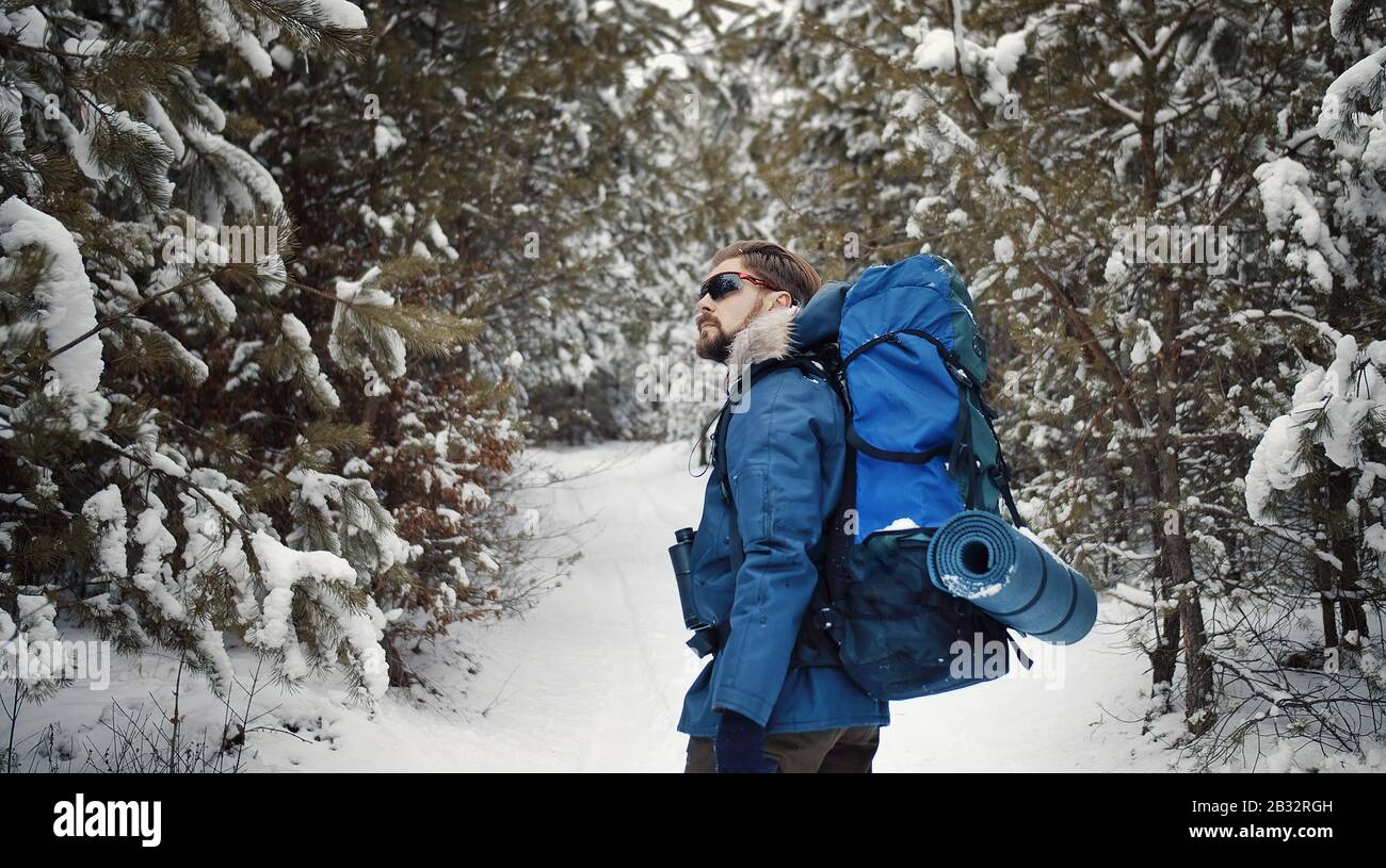 Man hiker walking through forest hi-res stock photography and images ...