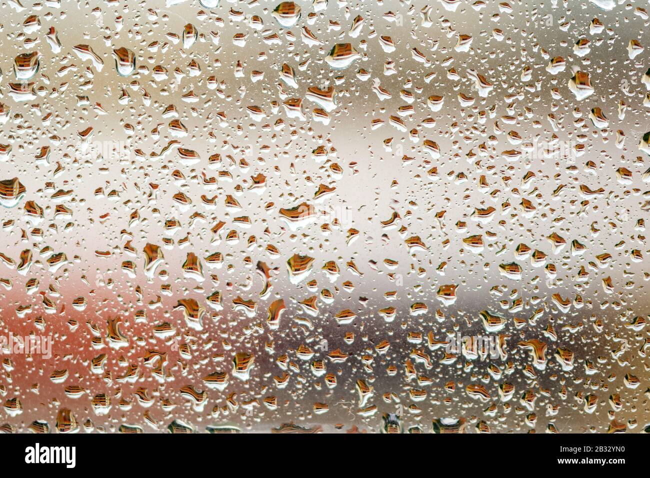 my window covered in raindrops in Marbella, Spain Stock Photo