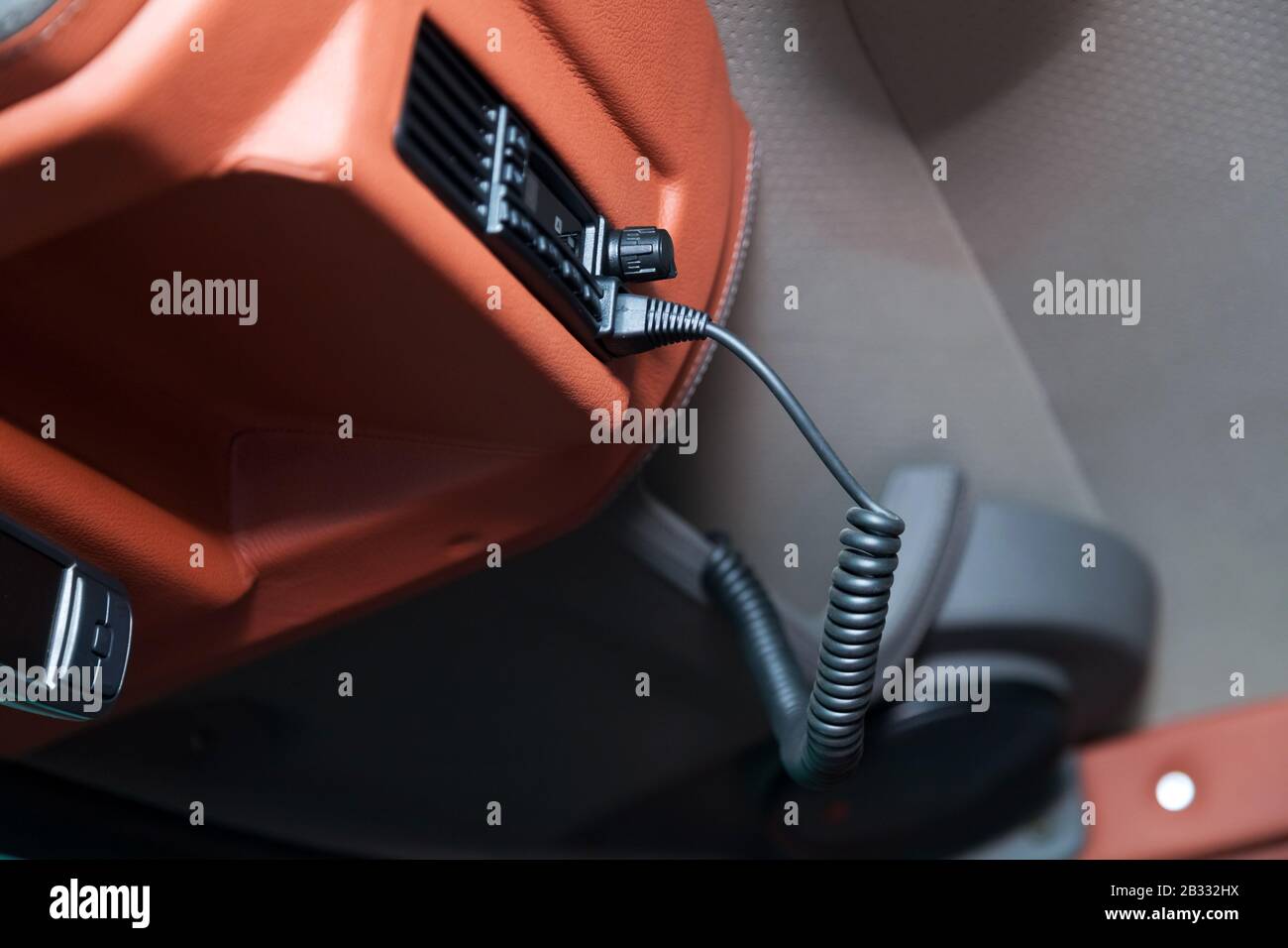 Mobile walkie-talkie on the ceiling of a truck with a microphone and a radio station for communication with emergency police, ambulance and firefighte Stock Photo