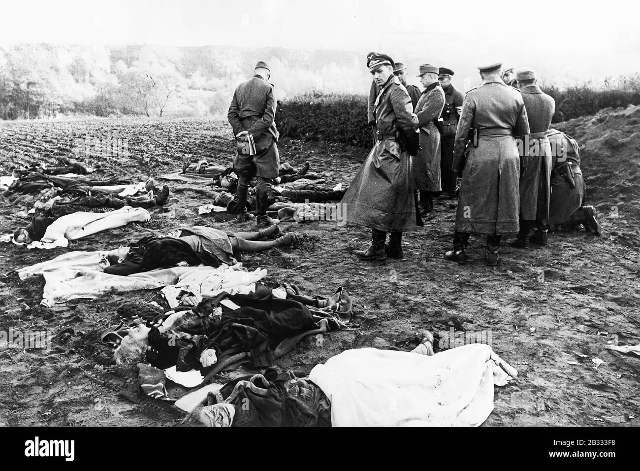 October 1944 German officers in the village of Nemmersdorf, where Red Army soldiers murdered several dozen inhabitants.  Goebbels tried to use this crime to strengthen hatred of the Soviets in Germany Stock Photo