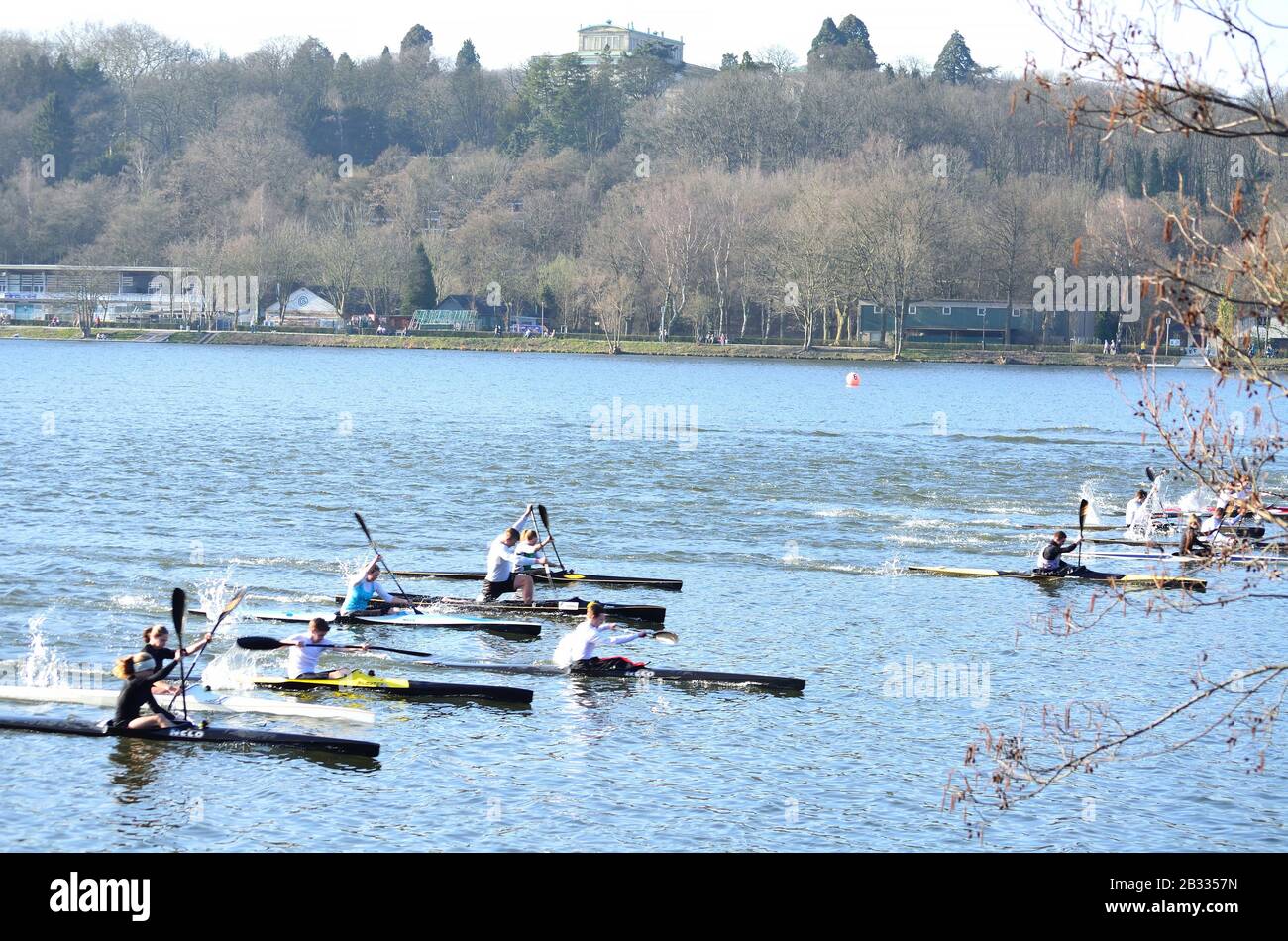 Essen, Germany - March, 10, 2014: Rowing training of canoeists in Essen Werden on the reservoir Baldeney. Stock Photo