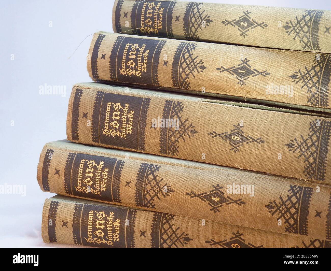 Heiligenhaus, Nrw, Germany - February 12, 2014: Photo of a pile of old books of the famous writer Hermann Lons.  Here see the works of 1 to 5 from a t Stock Photo