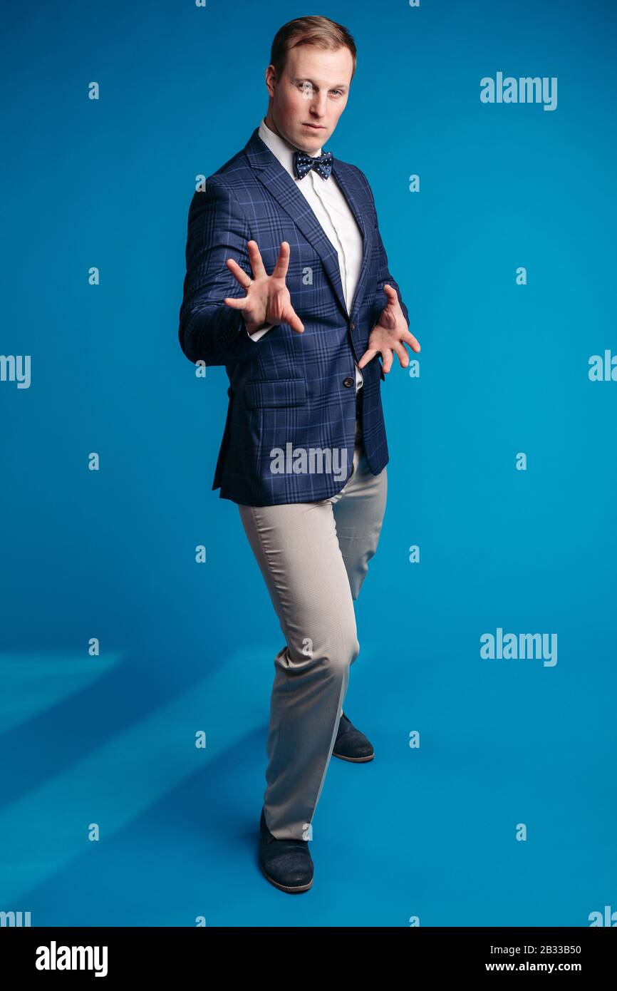 Portrait of handsome man in black suit Stock Photo - Alamy