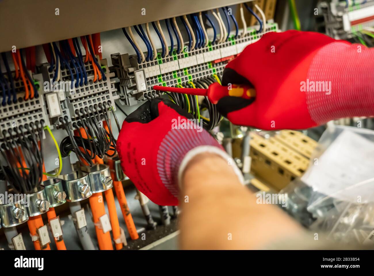 Electrician doing an installation Stock Photo