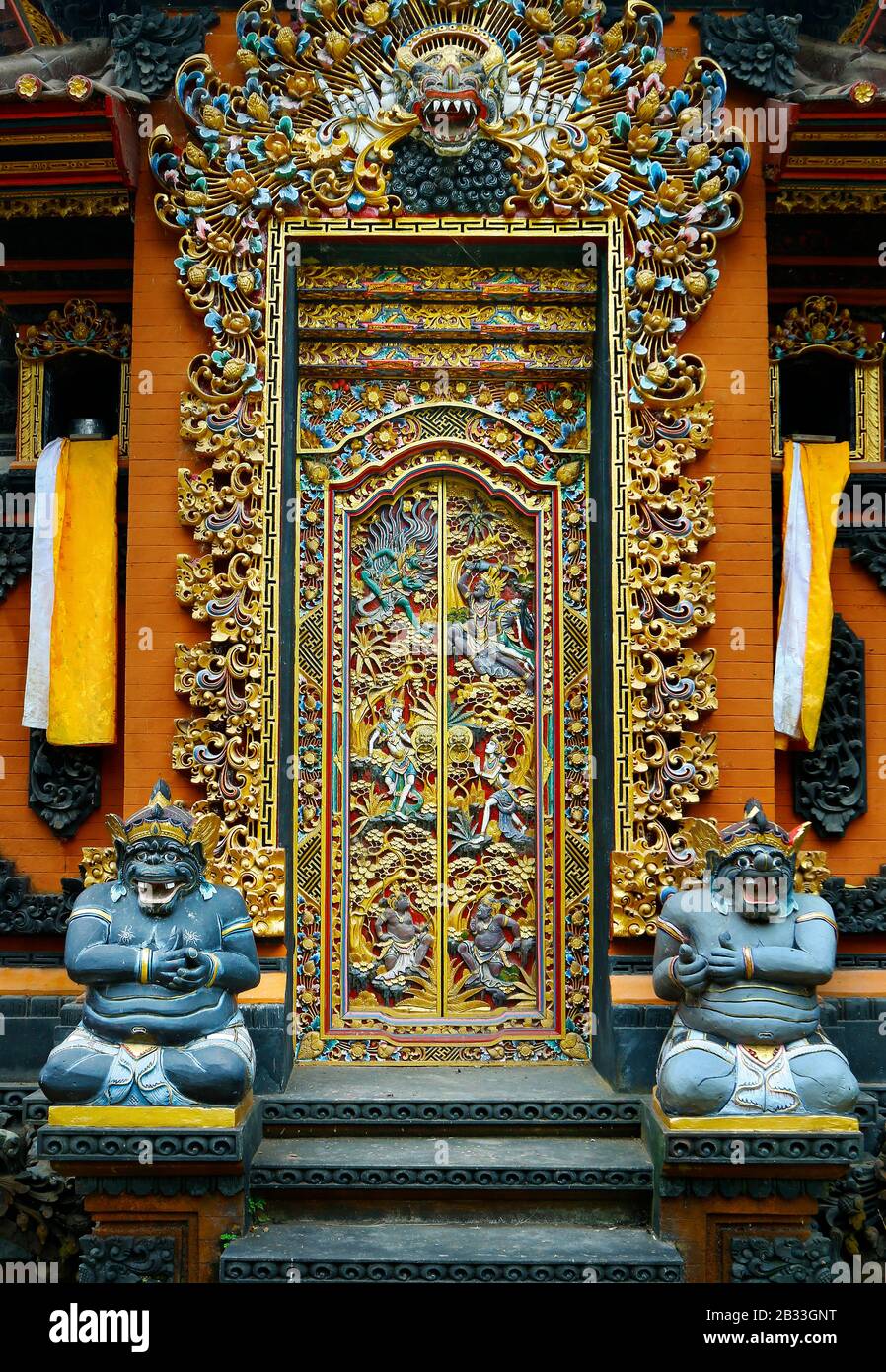 wooden carved door  in hindu temple in Bali-Indonesia Stock Photo