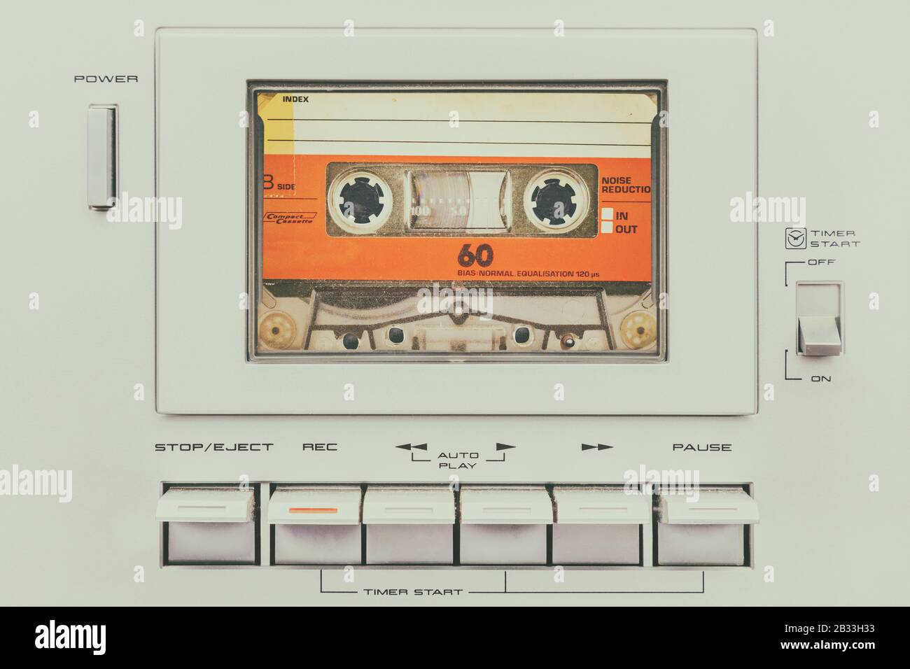 Retro styled image of a vintage silver audio cassette player with buttons Stock Photo