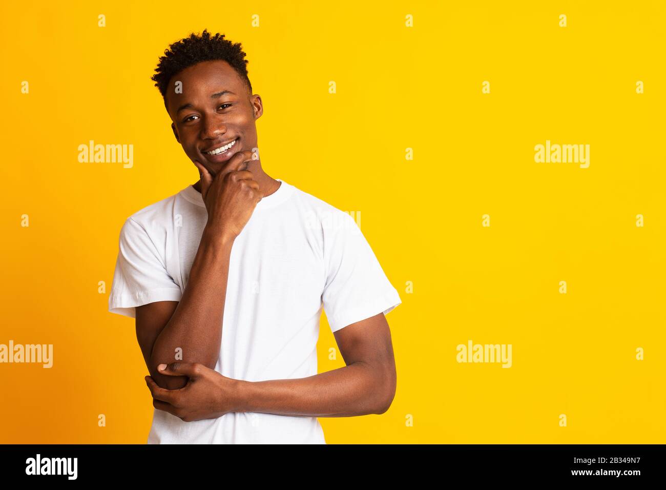 Man chin hand touching hi-res stock photography and images - Alamy