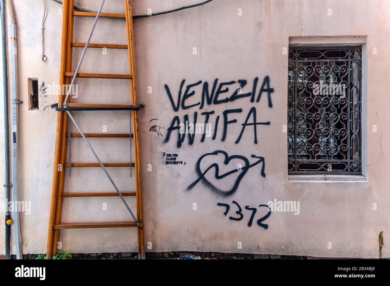 'Venezia antifa' graffiti on a street wall in Venice, Italy Stock Photo