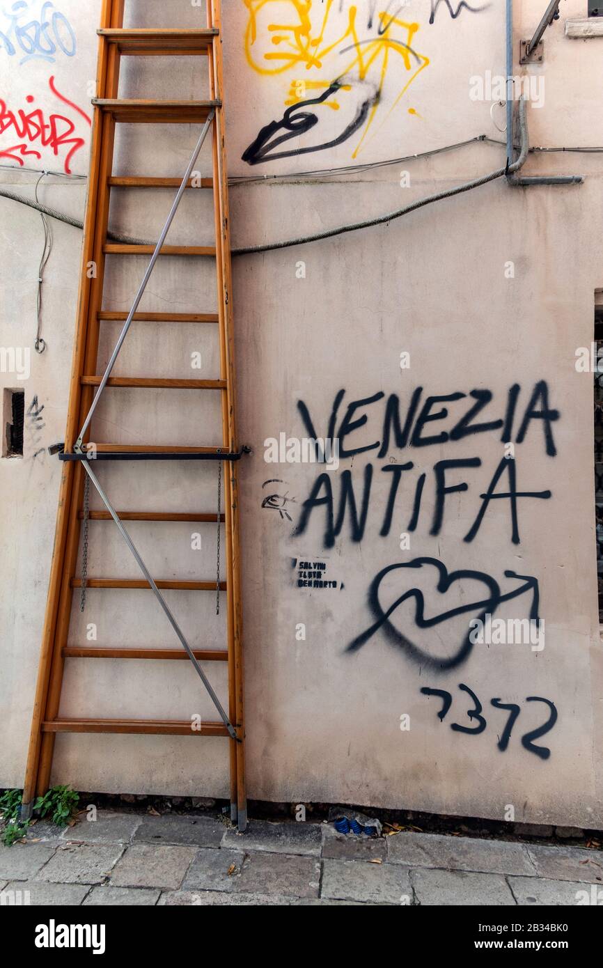 'Venezia antifa' graffiti on a street wall in Venice, Italy Stock Photo