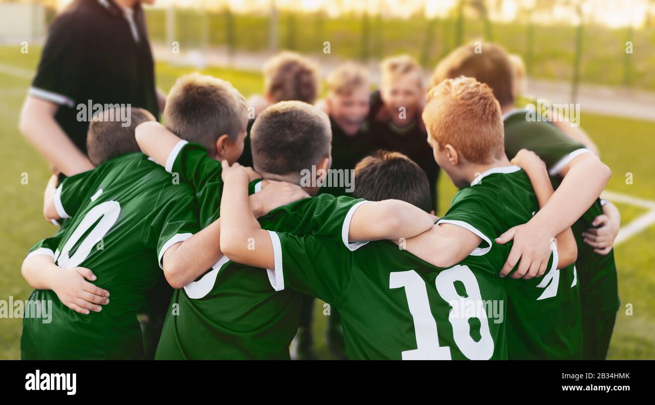 Coaching Youth Sports. Group Of Children In Soccer Team. School