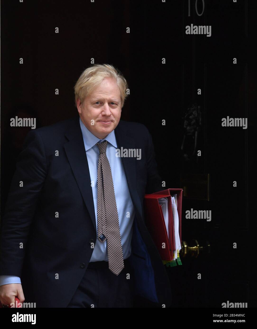 Prime Minister Boris Johnson leaves 10 Downing Street, London, for the House of Commons for Prime Minister's Questions. Stock Photo