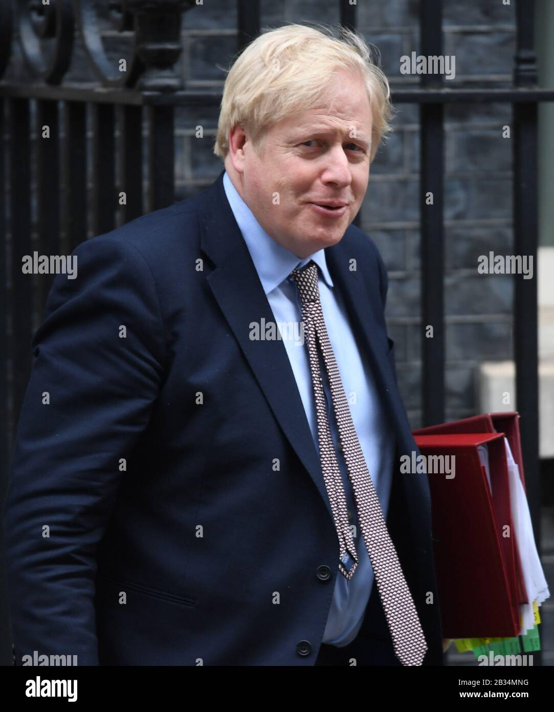 Prime Minister Boris Johnson leaves 10 Downing Street, London, for the House of Commons for Prime Minister's Questions. Stock Photo