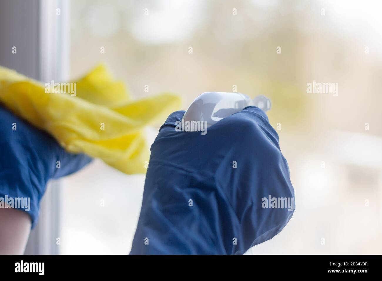 Gloved hand man cleaning hi-res stock photography and images - Alamy