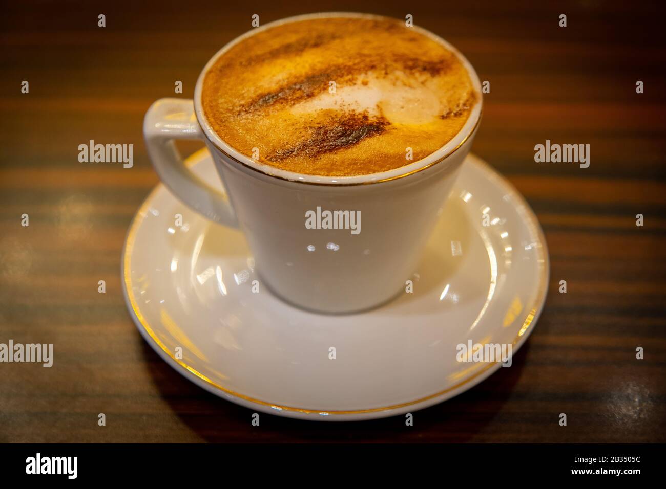 Capuccino coffee served at a cafe near Trafalgar square Stock Photo Alamy