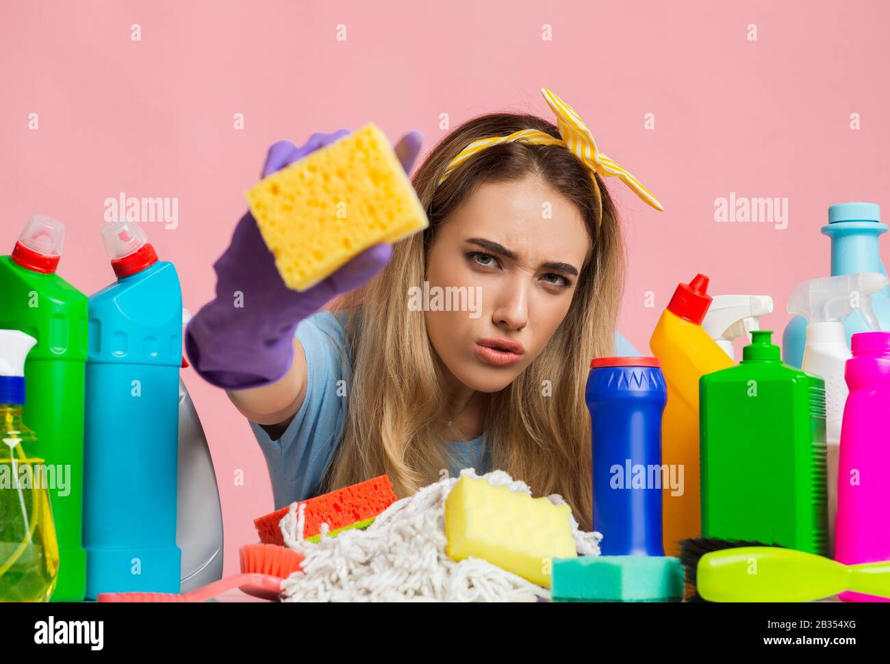 Concentrated girl as if wiping the screen Stock Photo Alamy