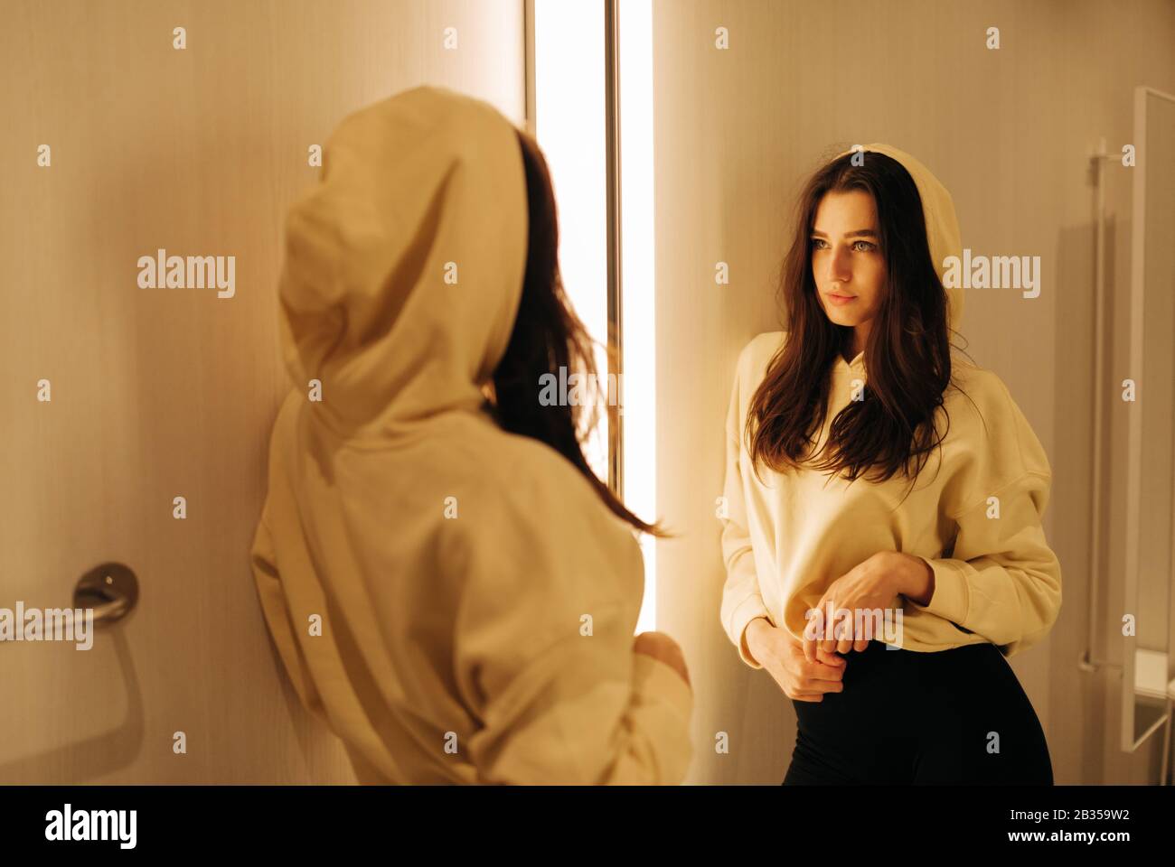young woman in the fitting room Stock Photo