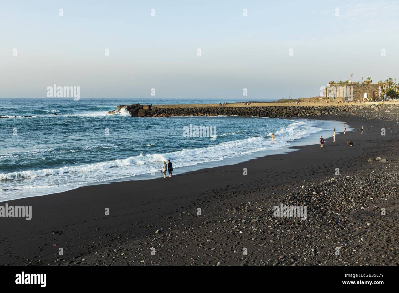 People on the beach at Playa Jardin, Puerto de la Cruz, Tenerife, Canary Islands, Spain, Stock Photo