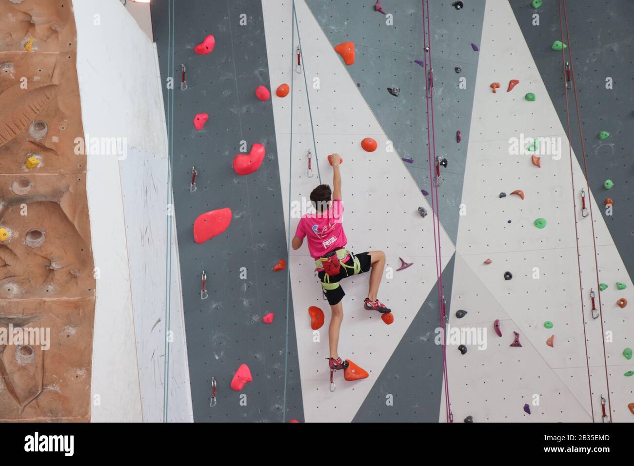 sport climbing, boy climbing indoor wall Stock Photo Alamy