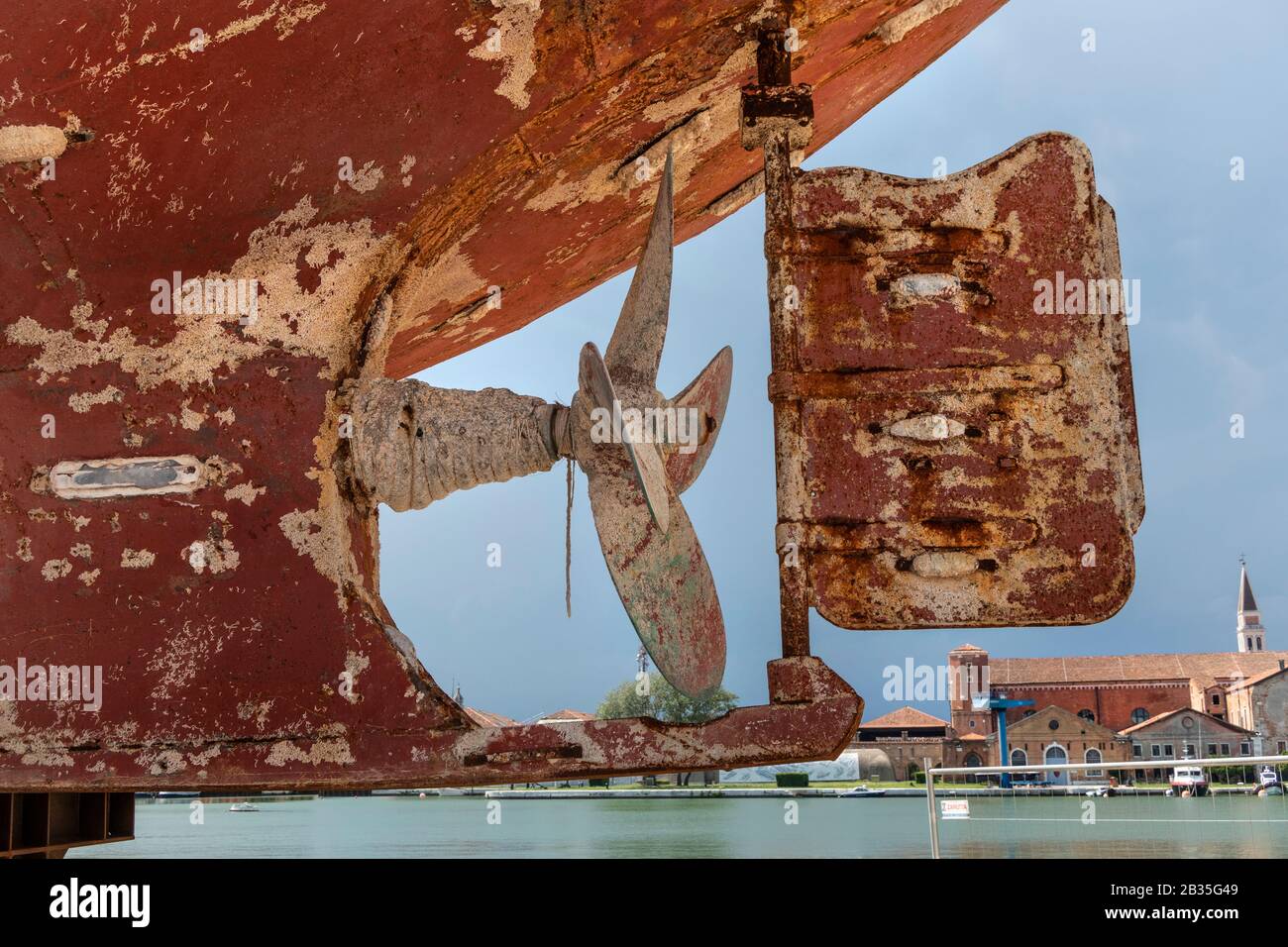 The wreckage of a boat on show at the 58th Venice Biennale, Arsenale, Italy 2019.   Hundreds of migrants died when it capsized and sank off the coast of Libya in 2015.  By Artist Christoph Büchel who masterminded the project titled 'Barca Nostra' ('Our boat') Stock Photo