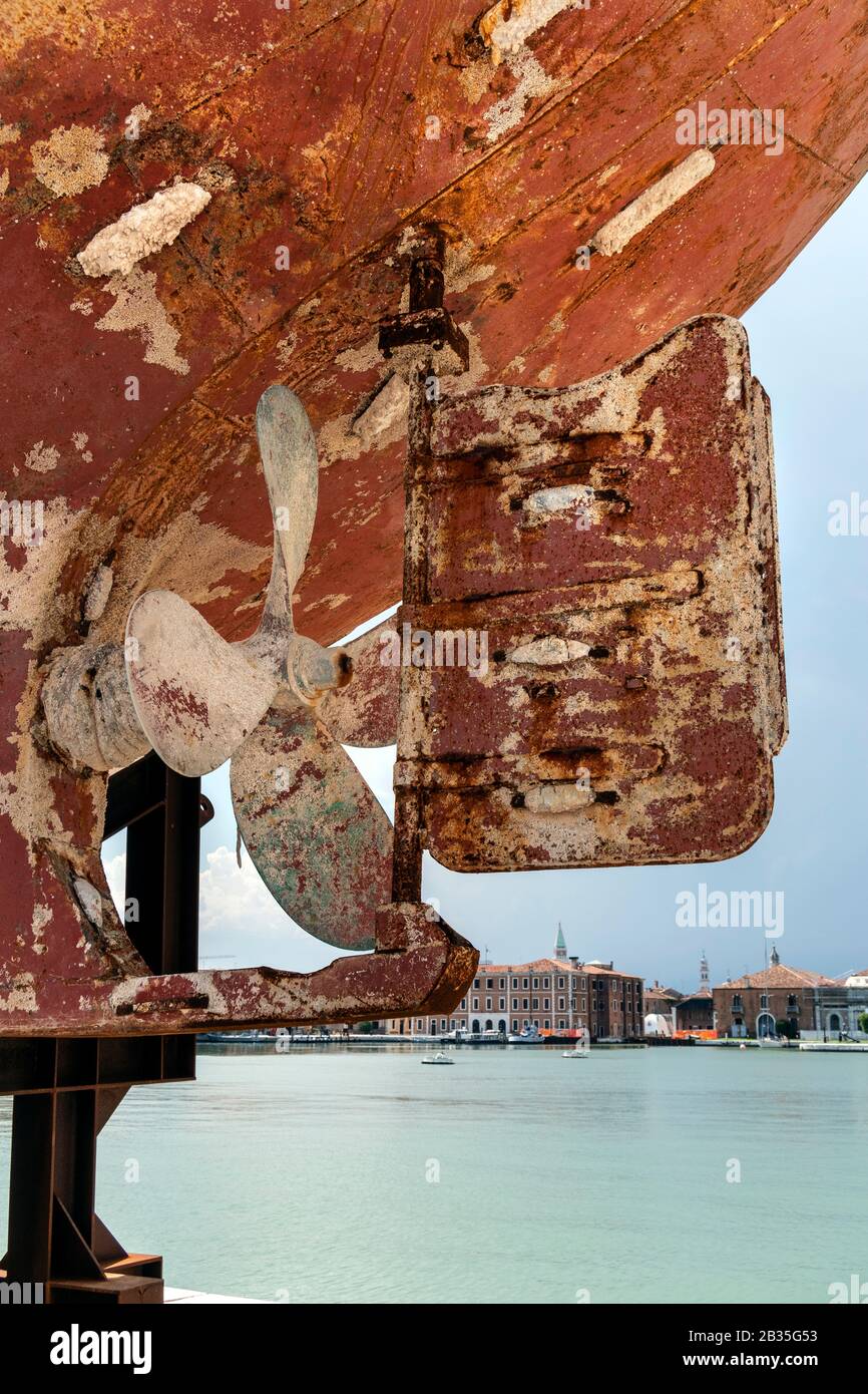 The wreckage of a boat on show at the 58th Venice Biennale, Arsenale, Italy 2019.   Hundreds of migrants died when it capsized and sank off the coast of Libya in 2015.  By Artist Christoph Büchel who masterminded the project titled 'Barca Nostra' ('Our boat') Stock Photo