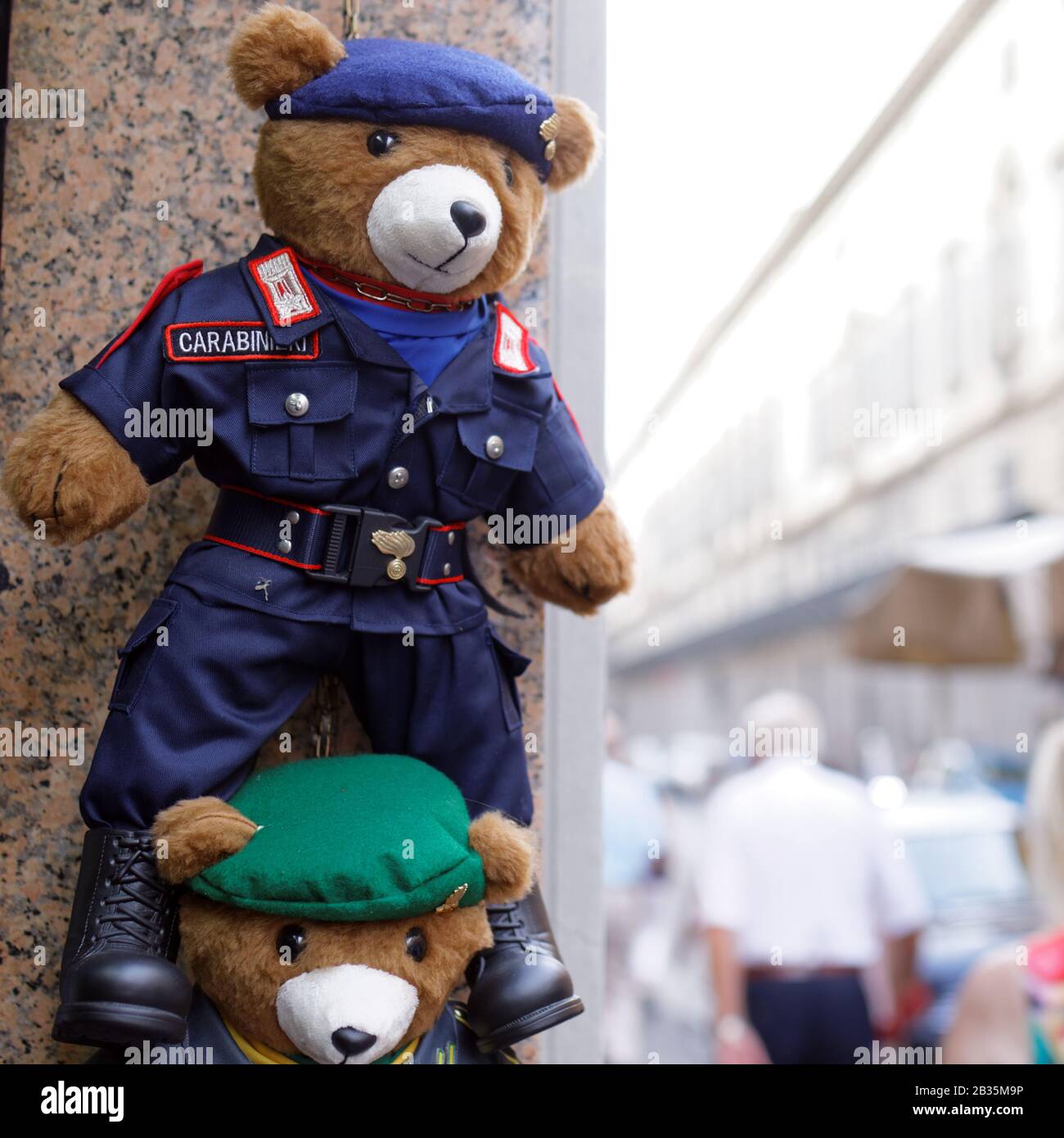 Teddy bears dressed in uniform of Italian Carabinieri at the entrance to a toy shop in Florence, Italy Stock Photo