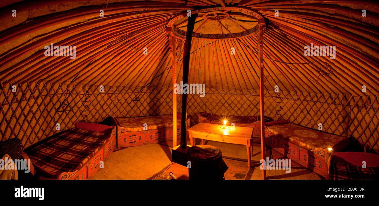 Mongolia, Omnogovi province, near Dalanzadgad, panoramic view of the interior of a candle-lit yurt Stock Photo