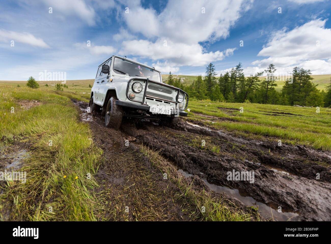 Mongolia, Khovsgol province, steppe near Khatgal, Russian jeep UAZ 469 on a muddy track Stock Photo