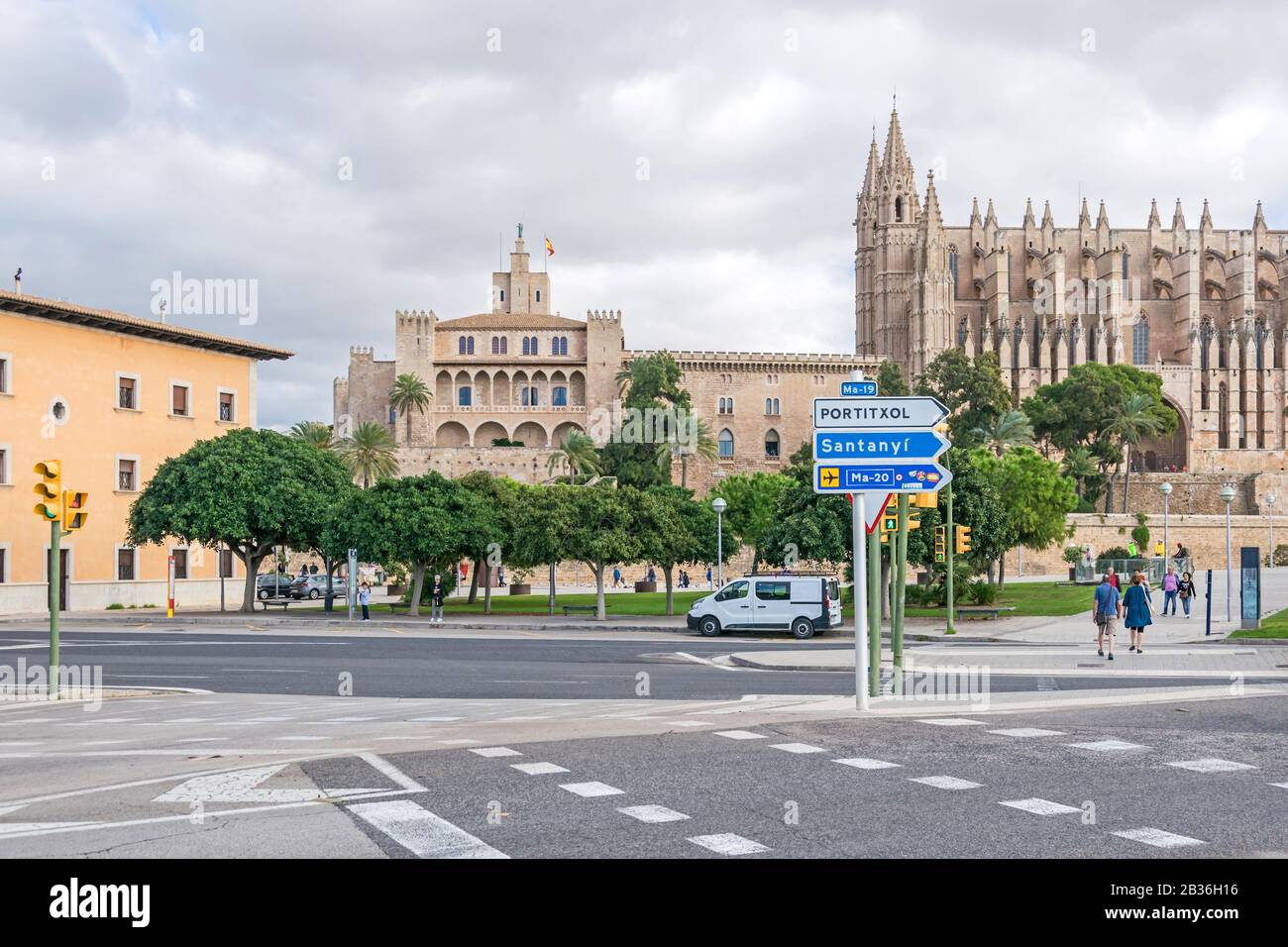 Palma de Mallorca, Spain - November 4, 2019: Sea promenade Paseo Maritimo and Roman Catholic Cathedral of Santa Maria of Palma, commonly referred to a Stock Photo