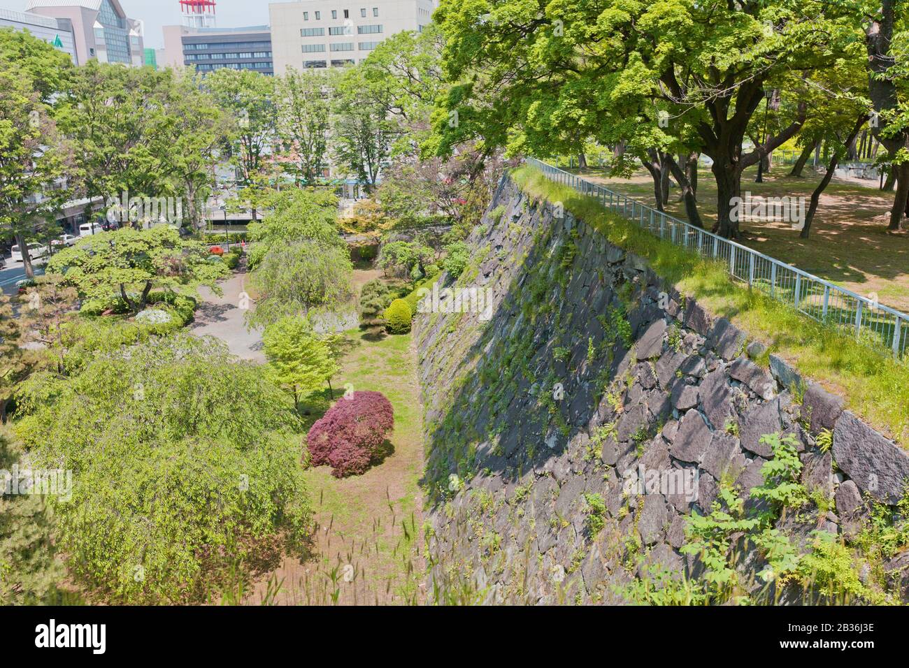 Stone walls (ishigaki) of former Morioka castle, constructed in 1633 and dismantled in 19th c. Today is National Historic Site of Japan Stock Photo