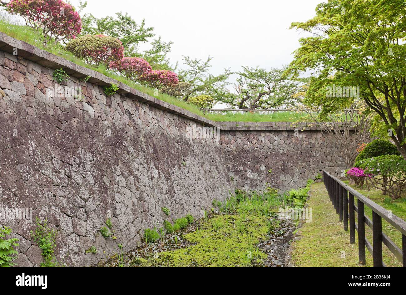 Stone walls (ishigaki) and moat of Goryokaku Fort in Hakodate, Hokkaido Island, Japan. Fort was erected in 1855, destroyed in 1869 Stock Photo
