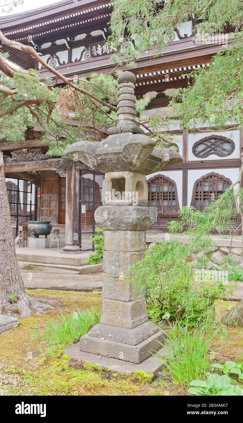 Traditional stone lantern (toro) near the main hall of Naganobeyama