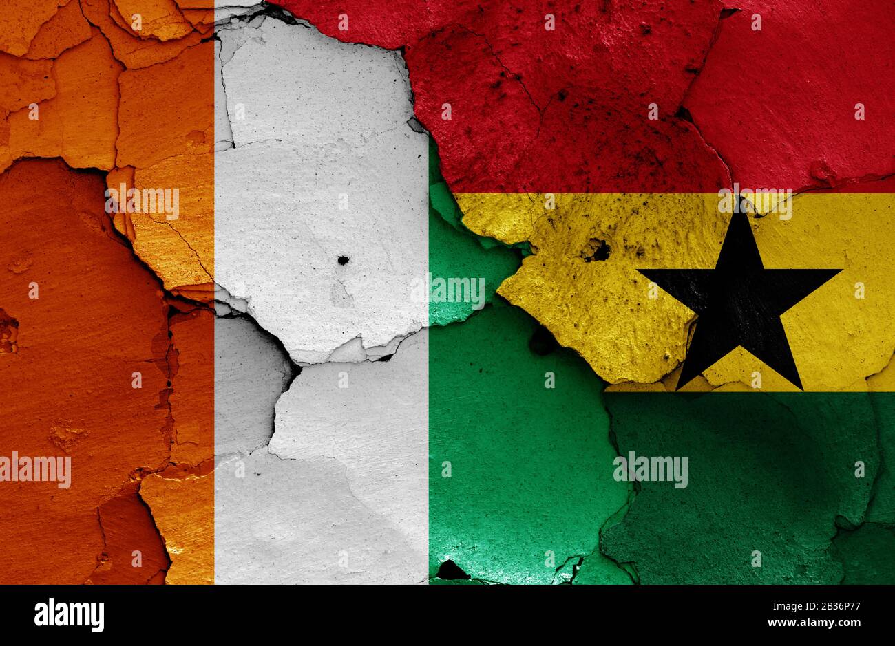 flags of Ivory Coast and Ghana painted on cracked wall Stock Photo Alamy